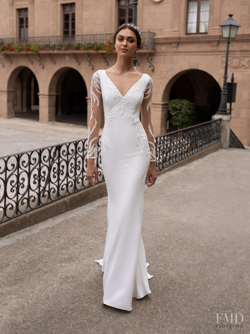 Zhenya Katava featured in  the Pronovias catalogue for Summer 2019