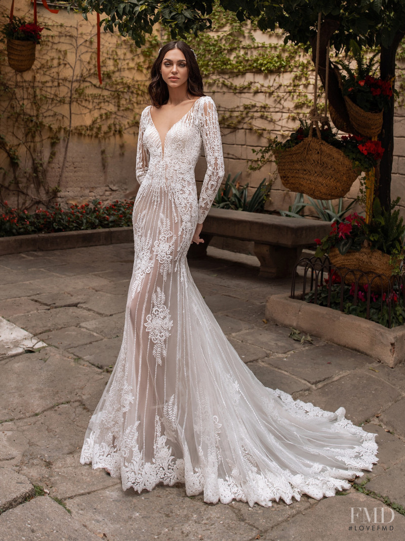 Zhenya Katava featured in  the Pronovias catalogue for Summer 2019