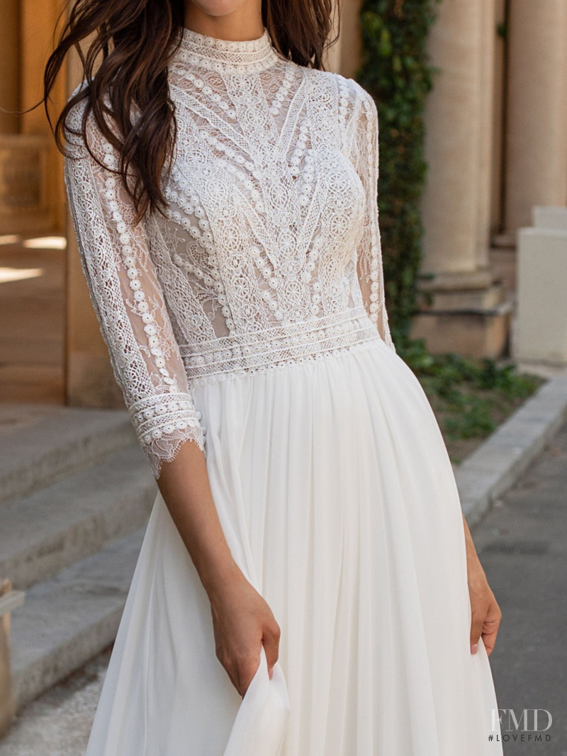 Zhenya Katava featured in  the Pronovias catalogue for Summer 2019