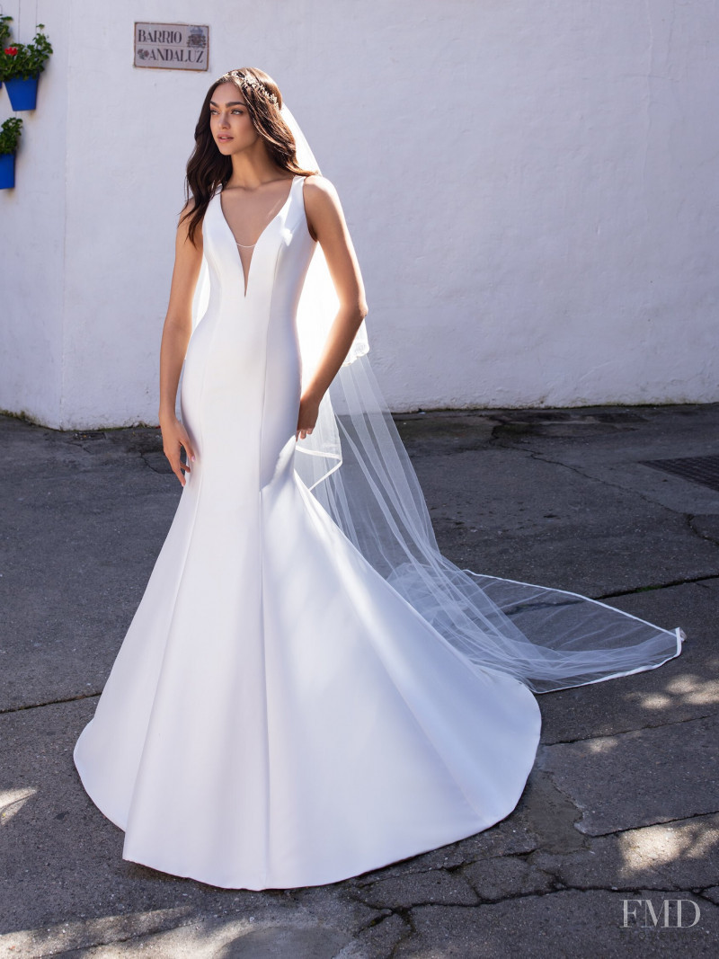 Zhenya Katava featured in  the Pronovias catalogue for Summer 2019