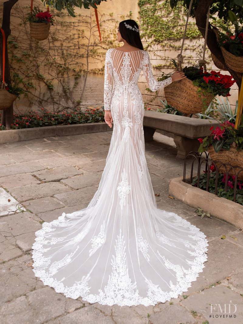 Zhenya Katava featured in  the Pronovias catalogue for Summer 2019