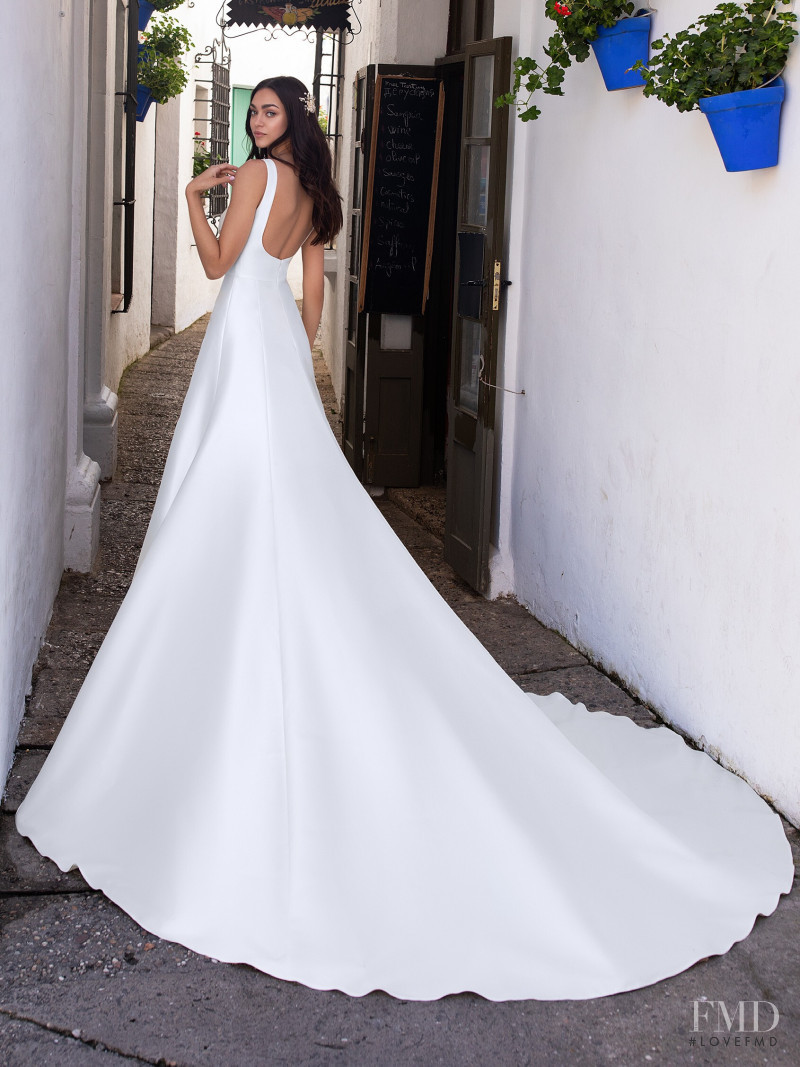 Zhenya Katava featured in  the Pronovias catalogue for Summer 2019