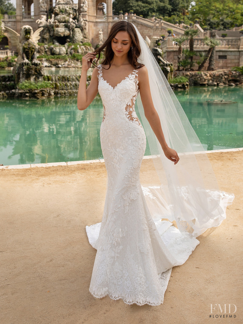 Zhenya Katava featured in  the Pronovias catalogue for Summer 2019