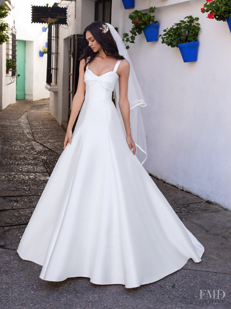 Zhenya Katava featured in  the Pronovias catalogue for Summer 2019