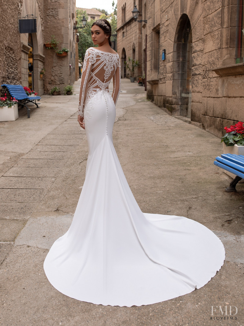 Zhenya Katava featured in  the Pronovias catalogue for Summer 2019