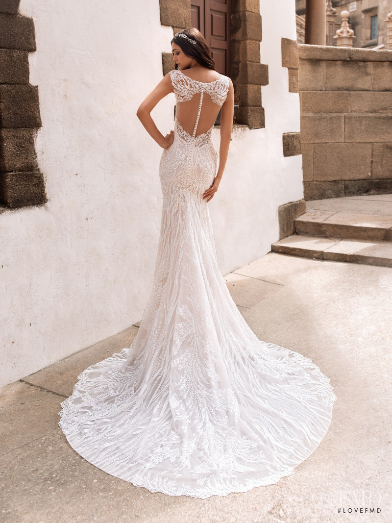 Zhenya Katava featured in  the Pronovias catalogue for Summer 2019