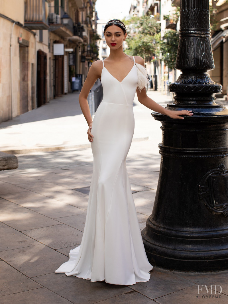 Zhenya Katava featured in  the Pronovias catalogue for Summer 2019