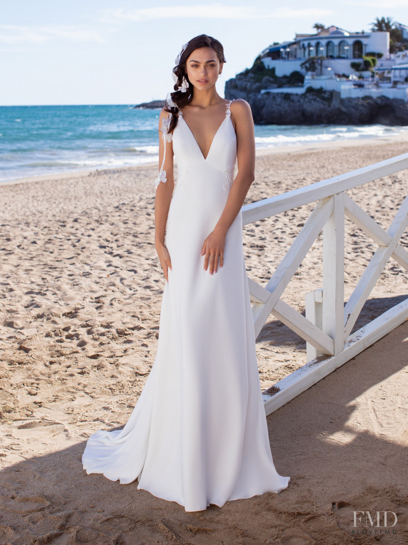 Zhenya Katava featured in  the Pronovias catalogue for Summer 2019