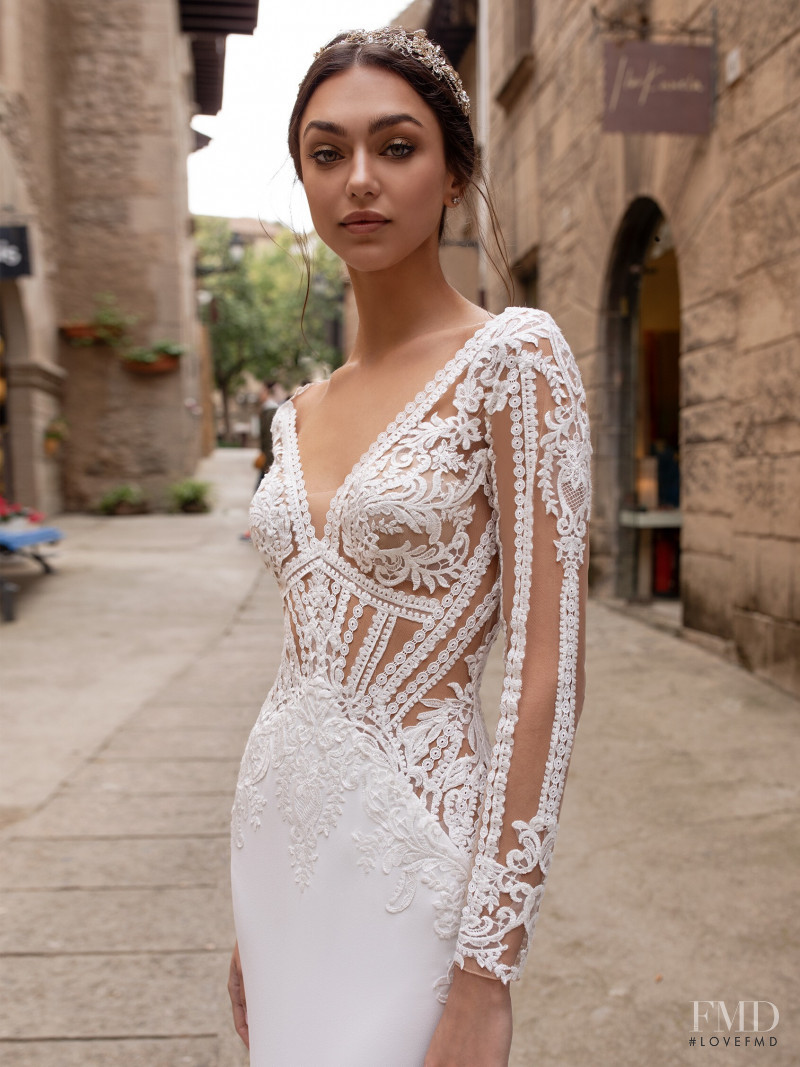 Zhenya Katava featured in  the Pronovias catalogue for Summer 2019