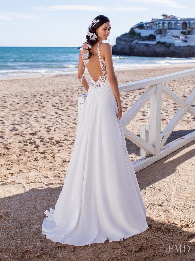 Zhenya Katava featured in  the Pronovias catalogue for Summer 2019