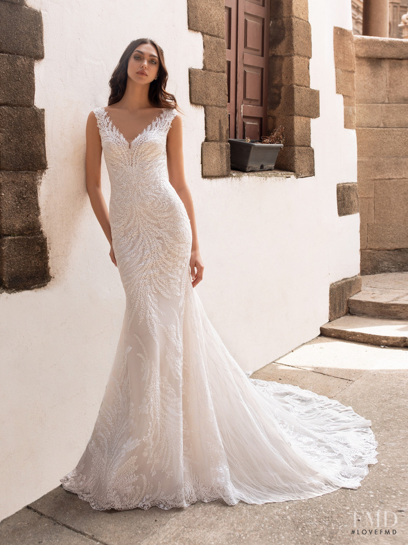 Zhenya Katava featured in  the Pronovias catalogue for Summer 2019