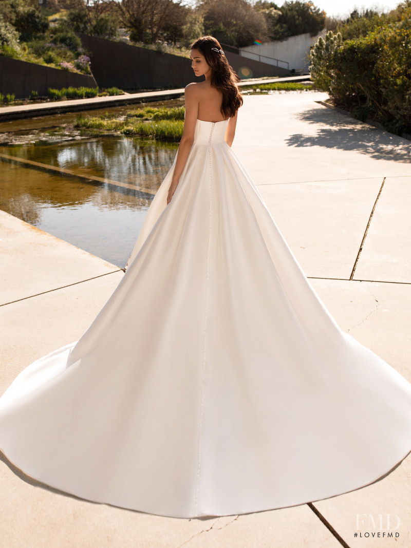 Zhenya Katava featured in  the Pronovias catalogue for Summer 2019