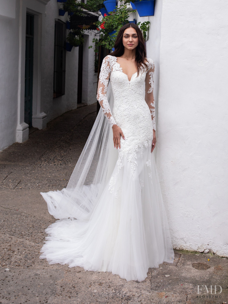 Zhenya Katava featured in  the Pronovias catalogue for Summer 2019