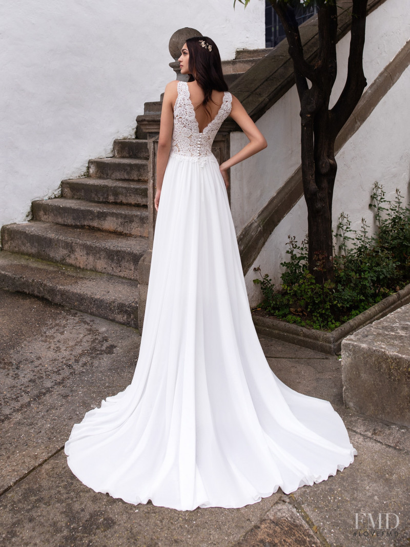 Zhenya Katava featured in  the Pronovias catalogue for Summer 2019