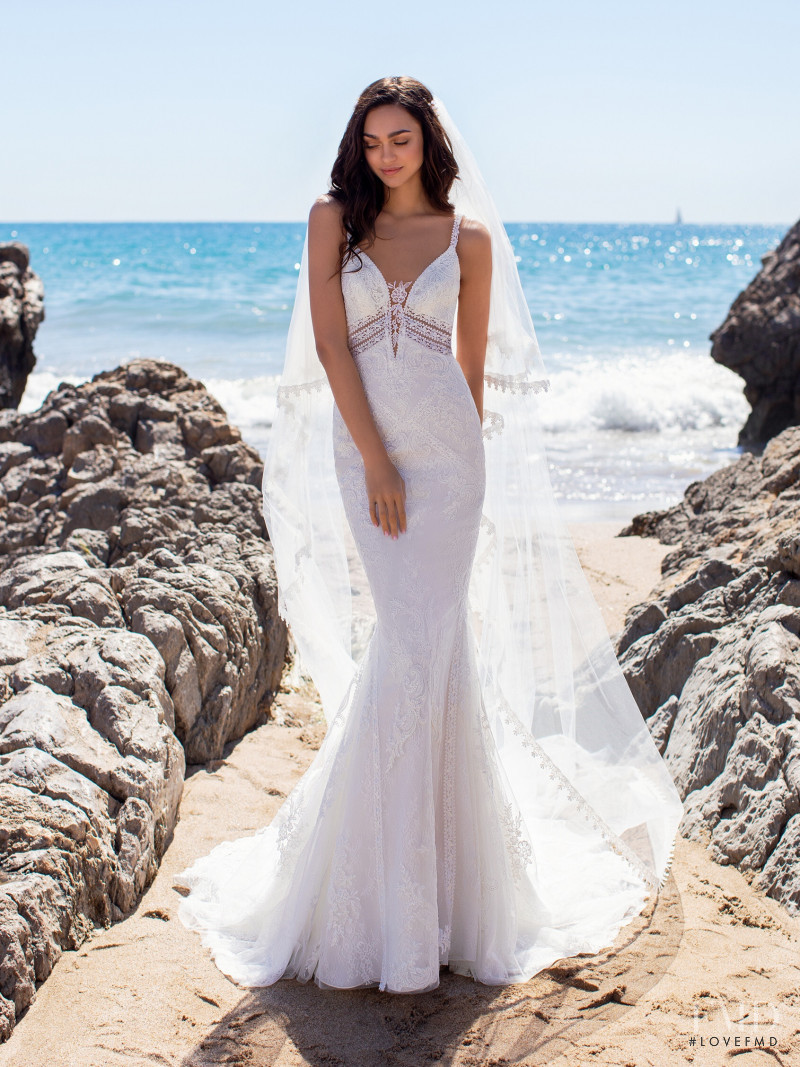 Zhenya Katava featured in  the Pronovias catalogue for Summer 2019