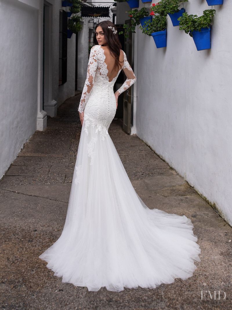 Zhenya Katava featured in  the Pronovias catalogue for Summer 2019