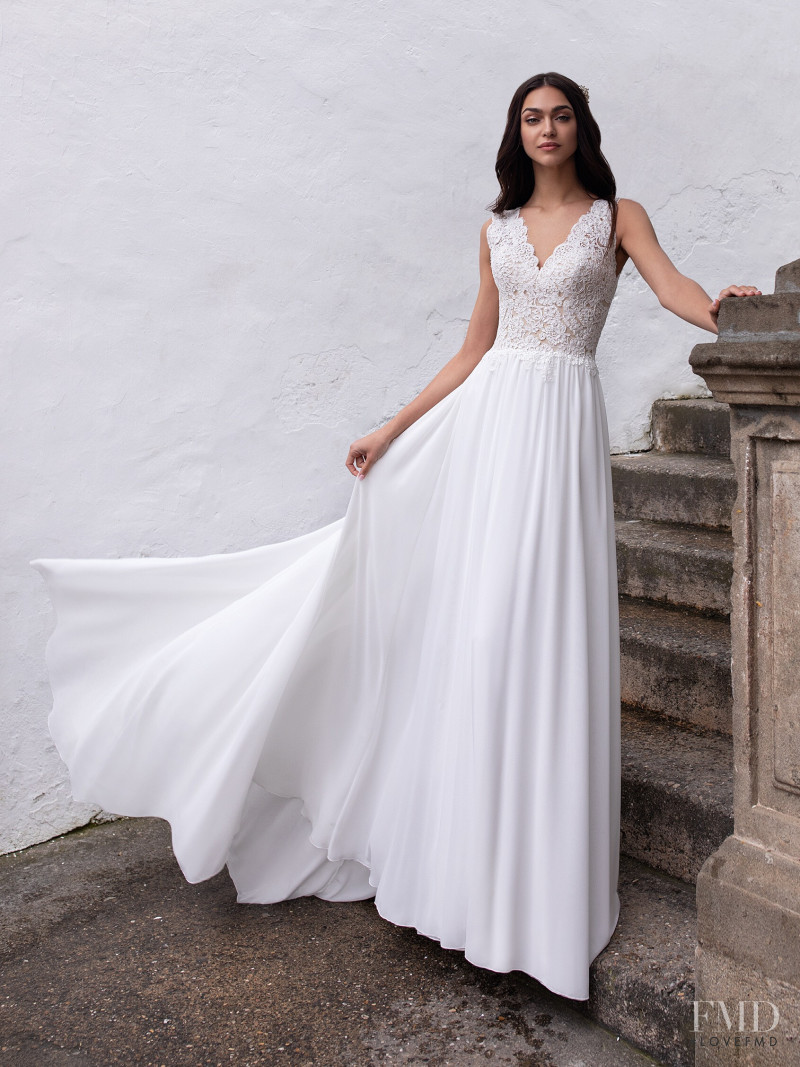 Zhenya Katava featured in  the Pronovias catalogue for Summer 2019