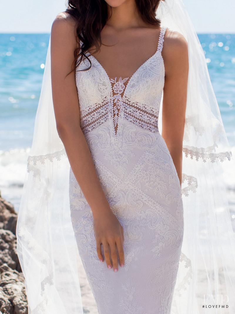 Zhenya Katava featured in  the Pronovias catalogue for Summer 2019