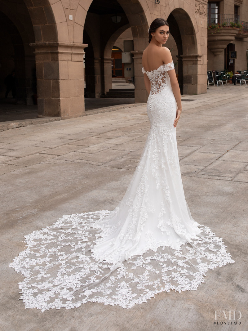 Zhenya Katava featured in  the Pronovias catalogue for Summer 2019