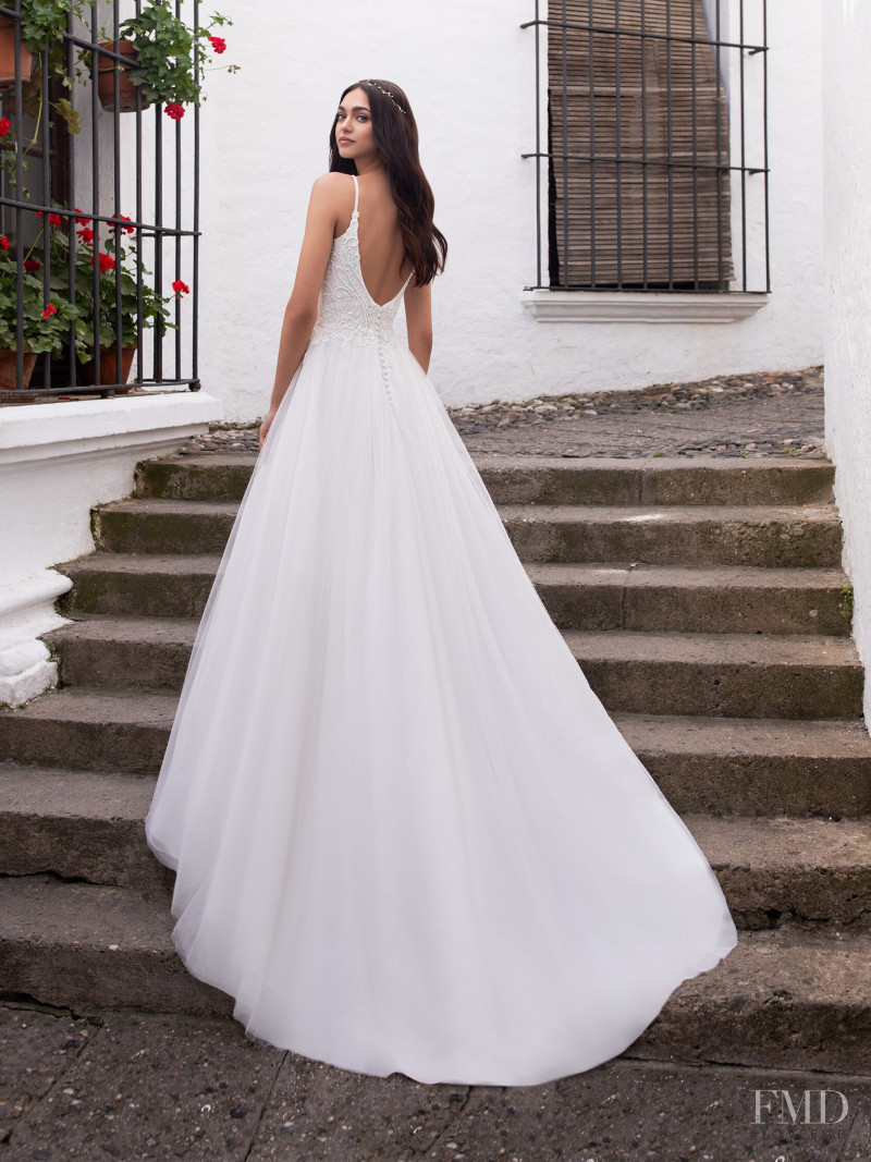 Zhenya Katava featured in  the Pronovias catalogue for Summer 2019