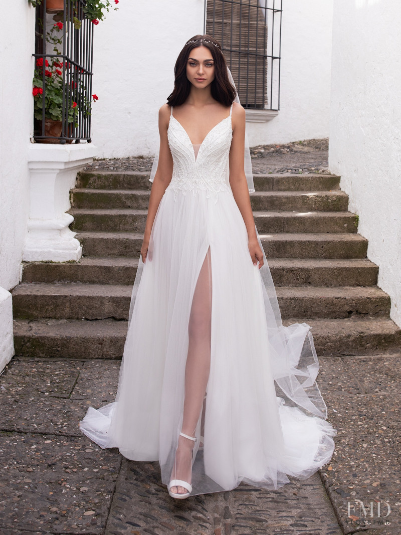 Zhenya Katava featured in  the Pronovias catalogue for Summer 2019