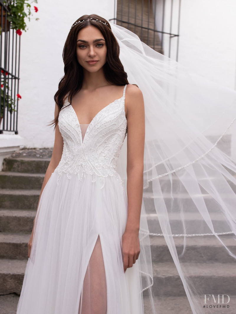 Zhenya Katava featured in  the Pronovias catalogue for Summer 2019