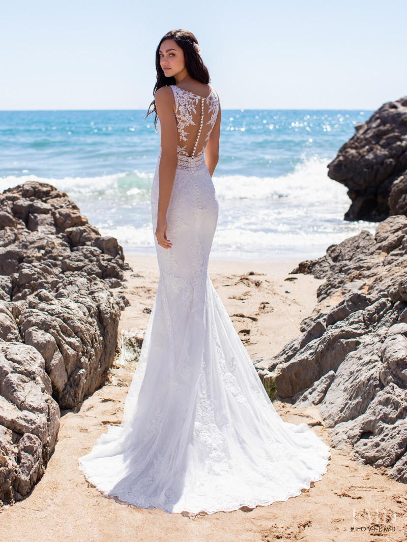 Zhenya Katava featured in  the Pronovias catalogue for Summer 2019