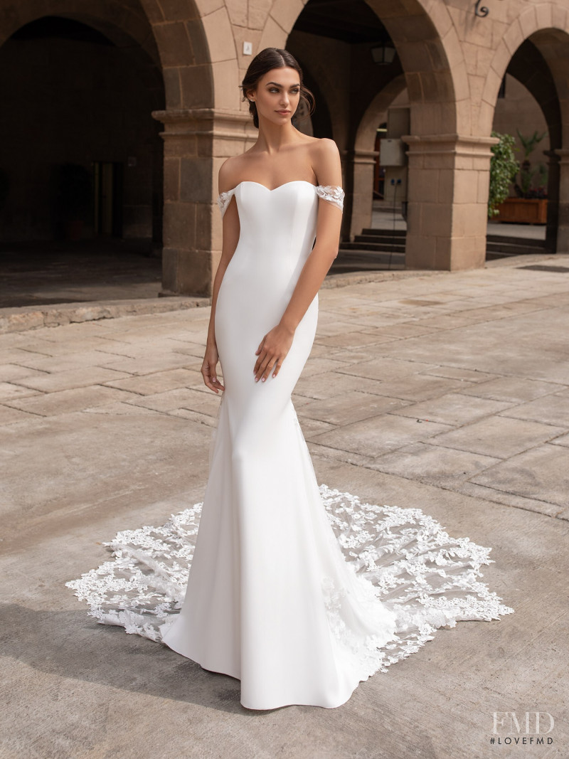 Zhenya Katava featured in  the Pronovias catalogue for Summer 2019