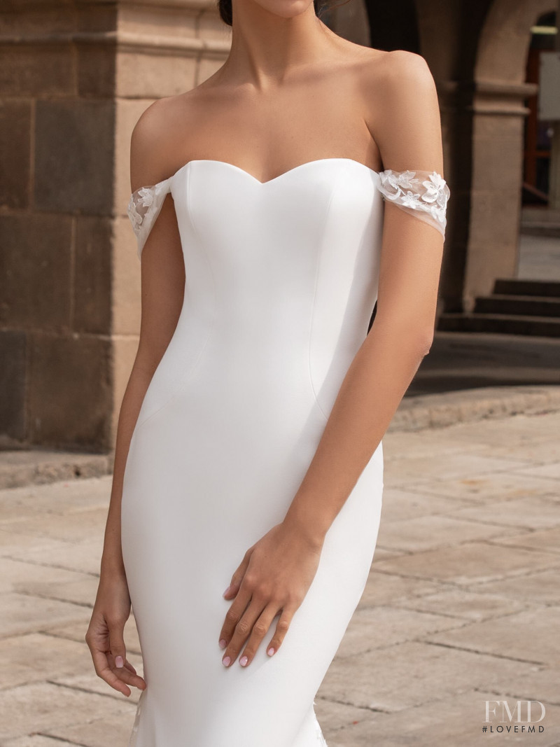 Zhenya Katava featured in  the Pronovias catalogue for Summer 2019