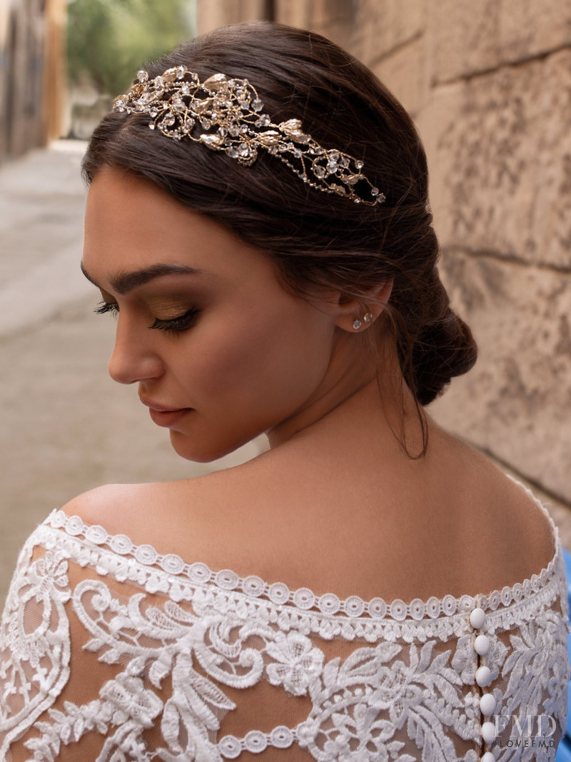 Zhenya Katava featured in  the Pronovias catalogue for Summer 2019