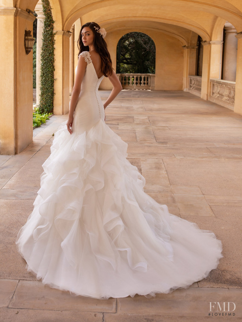 Zhenya Katava featured in  the Pronovias catalogue for Summer 2019