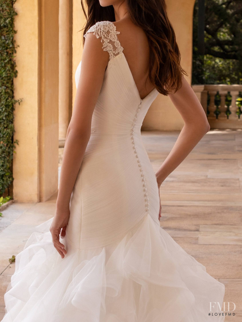 Zhenya Katava featured in  the Pronovias catalogue for Summer 2019