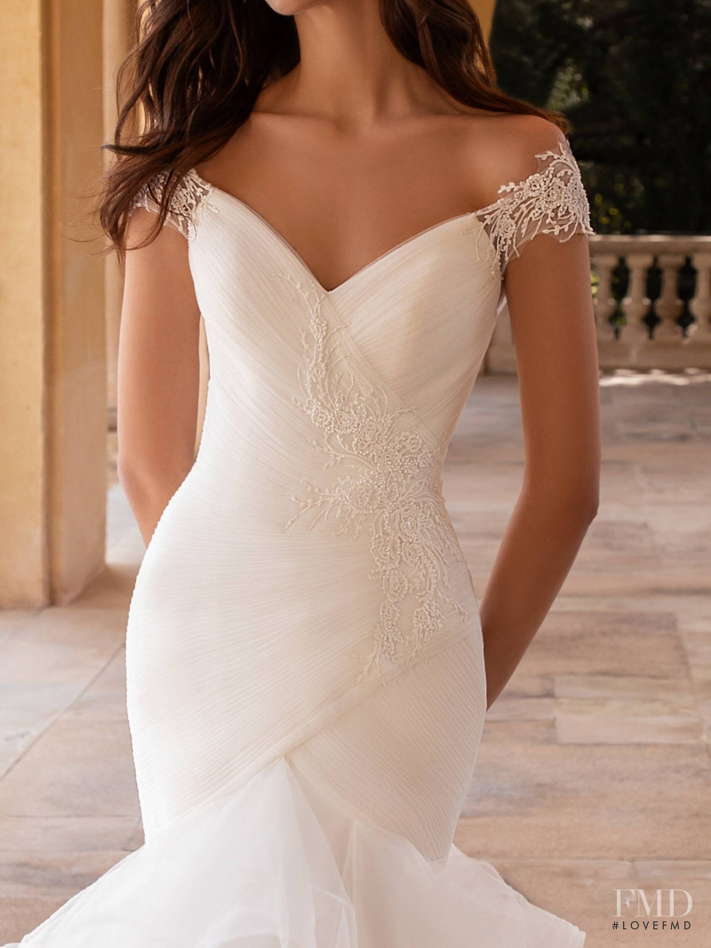 Zhenya Katava featured in  the Pronovias catalogue for Summer 2019