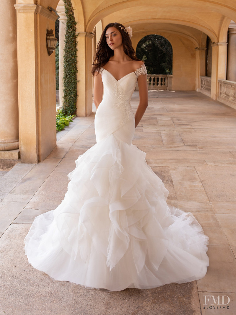 Zhenya Katava featured in  the Pronovias catalogue for Summer 2019