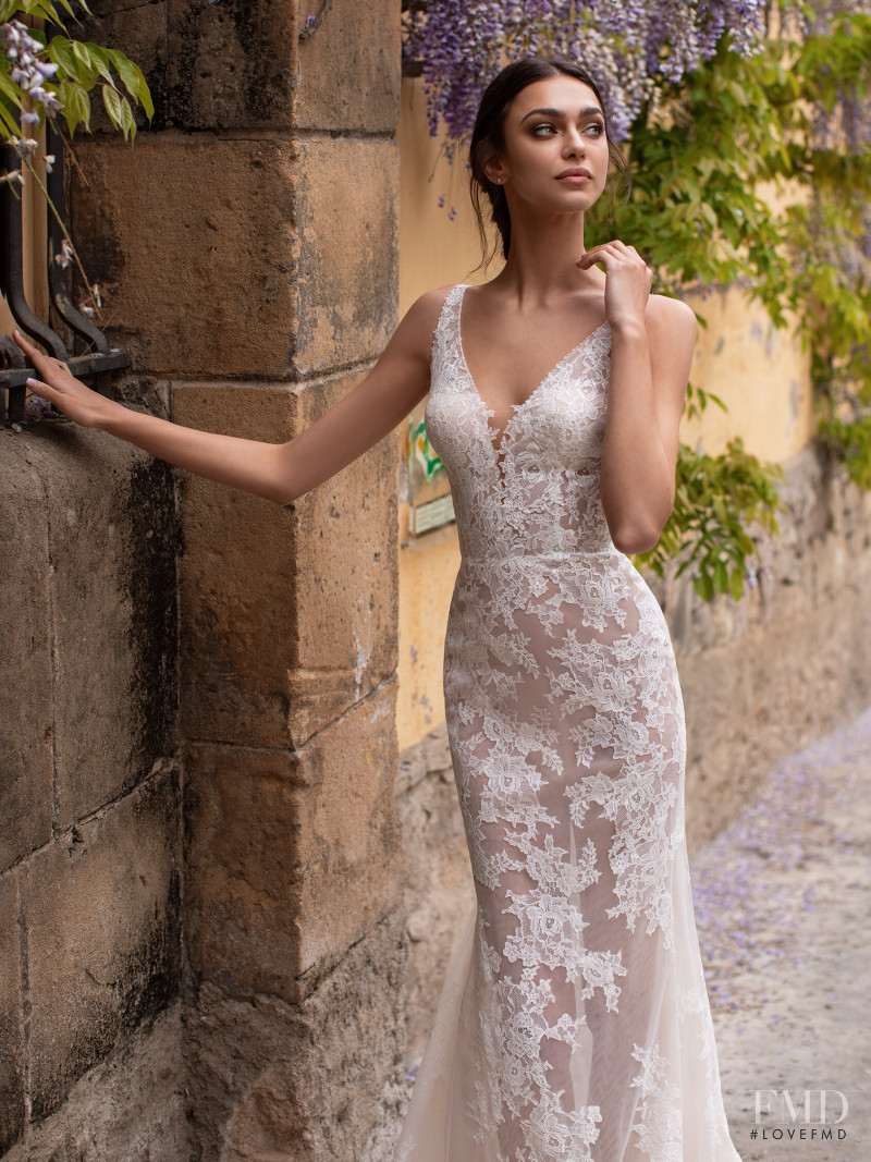 Zhenya Katava featured in  the Pronovias catalogue for Summer 2019