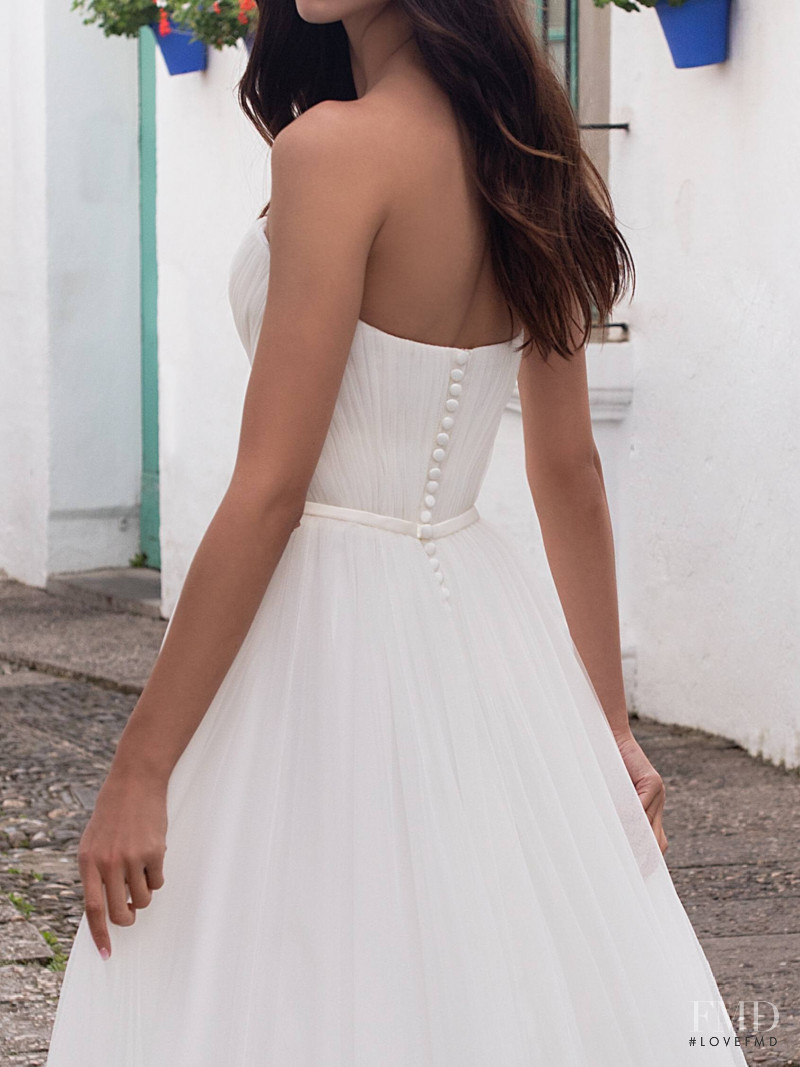 Zhenya Katava featured in  the Pronovias catalogue for Summer 2019