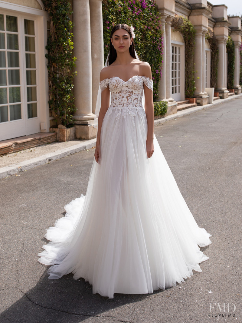 Zhenya Katava featured in  the Pronovias catalogue for Summer 2019