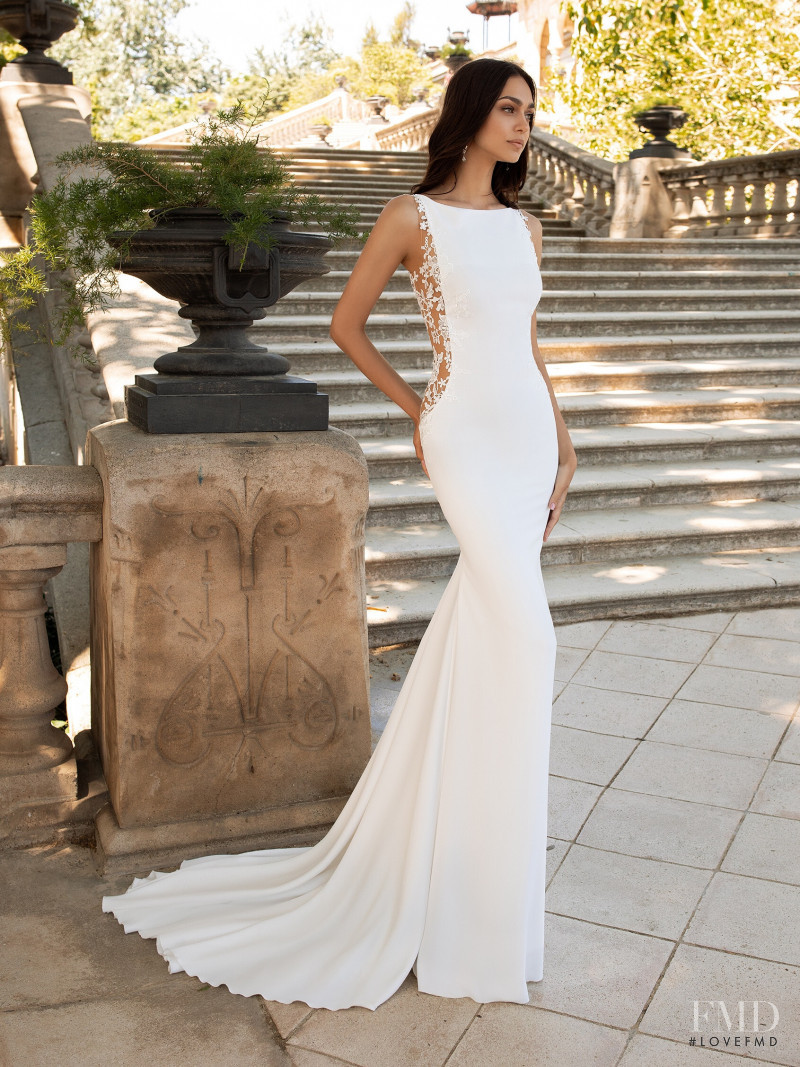 Zhenya Katava featured in  the Pronovias catalogue for Summer 2019