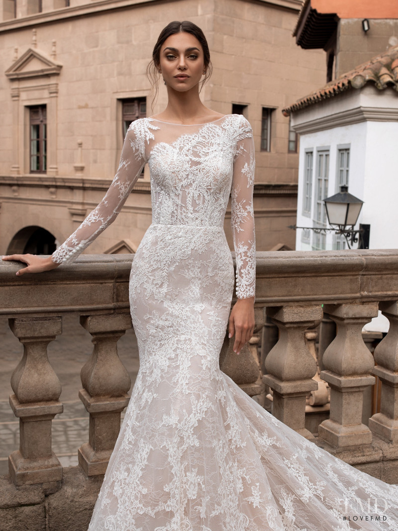 Zhenya Katava featured in  the Pronovias catalogue for Summer 2019