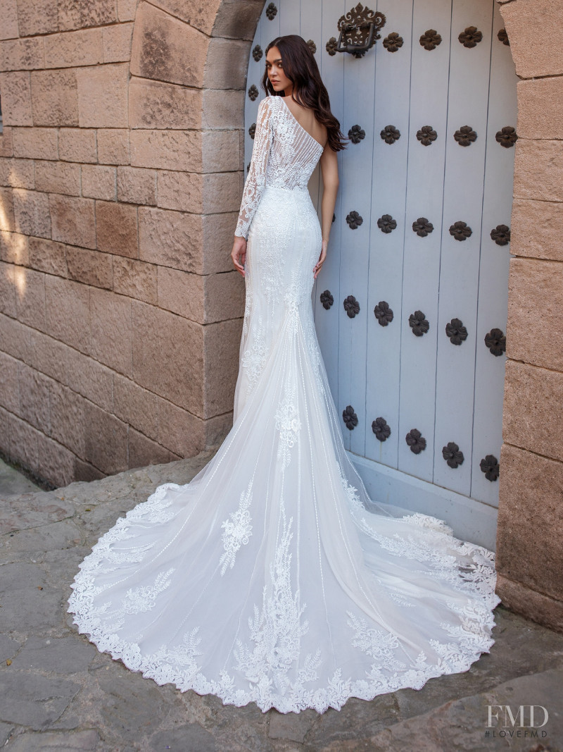 Zhenya Katava featured in  the Pronovias catalogue for Summer 2019