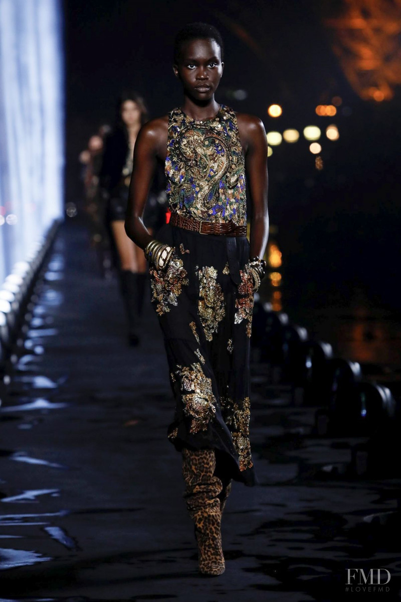 Achenrin Madit featured in  the Saint Laurent fashion show for Spring/Summer 2020