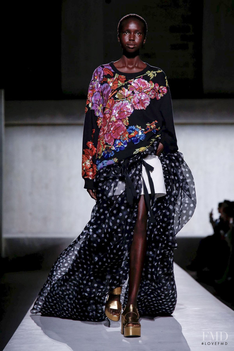 Ajok Madel featured in  the Dries van Noten fashion show for Spring/Summer 2020
