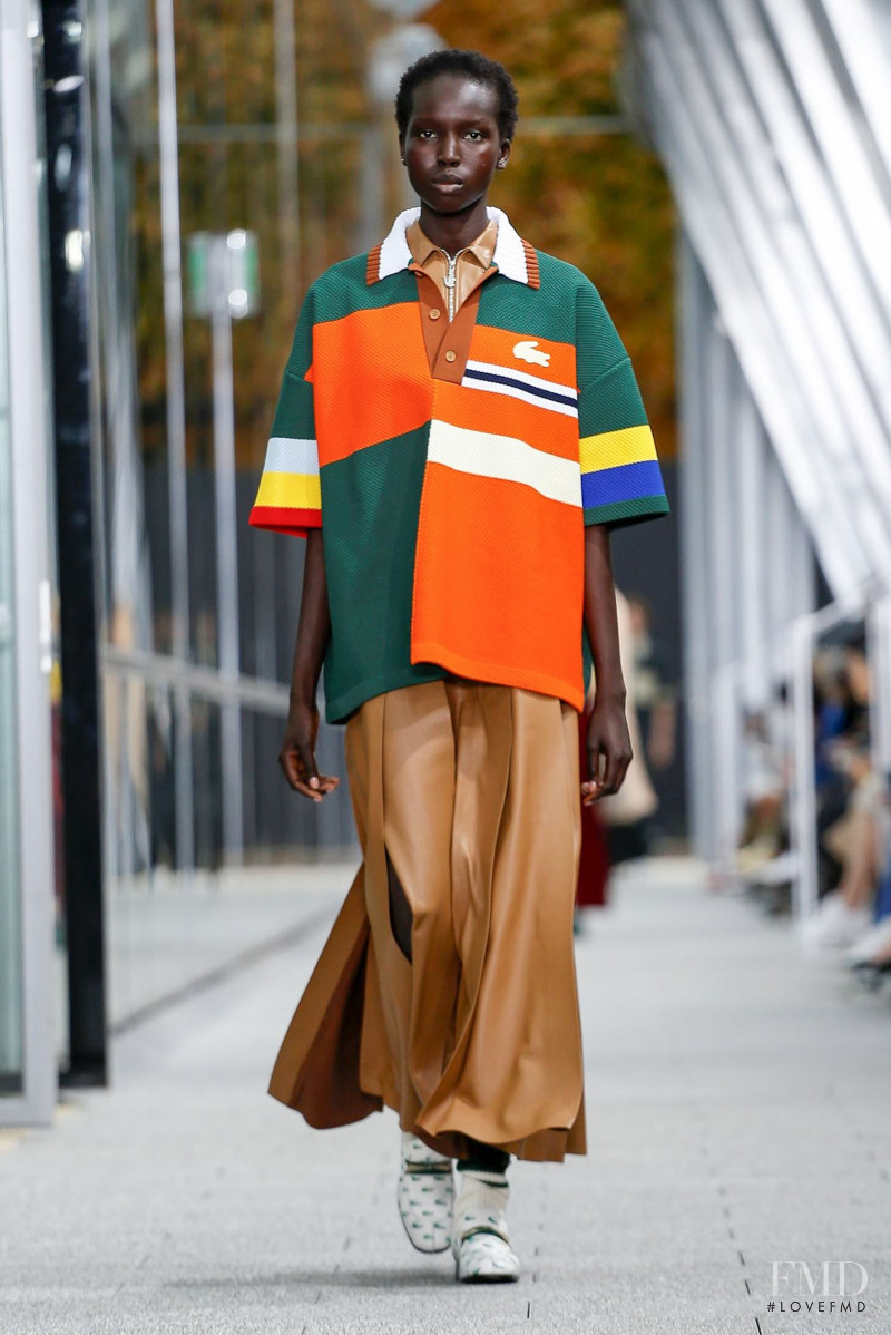 Ajok Madel featured in  the Lacoste fashion show for Spring/Summer 2020