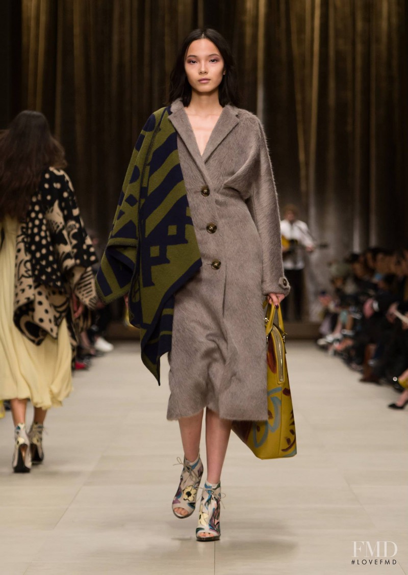 Xiao Wen Ju featured in  the Burberry Prorsum fashion show for Autumn/Winter 2014