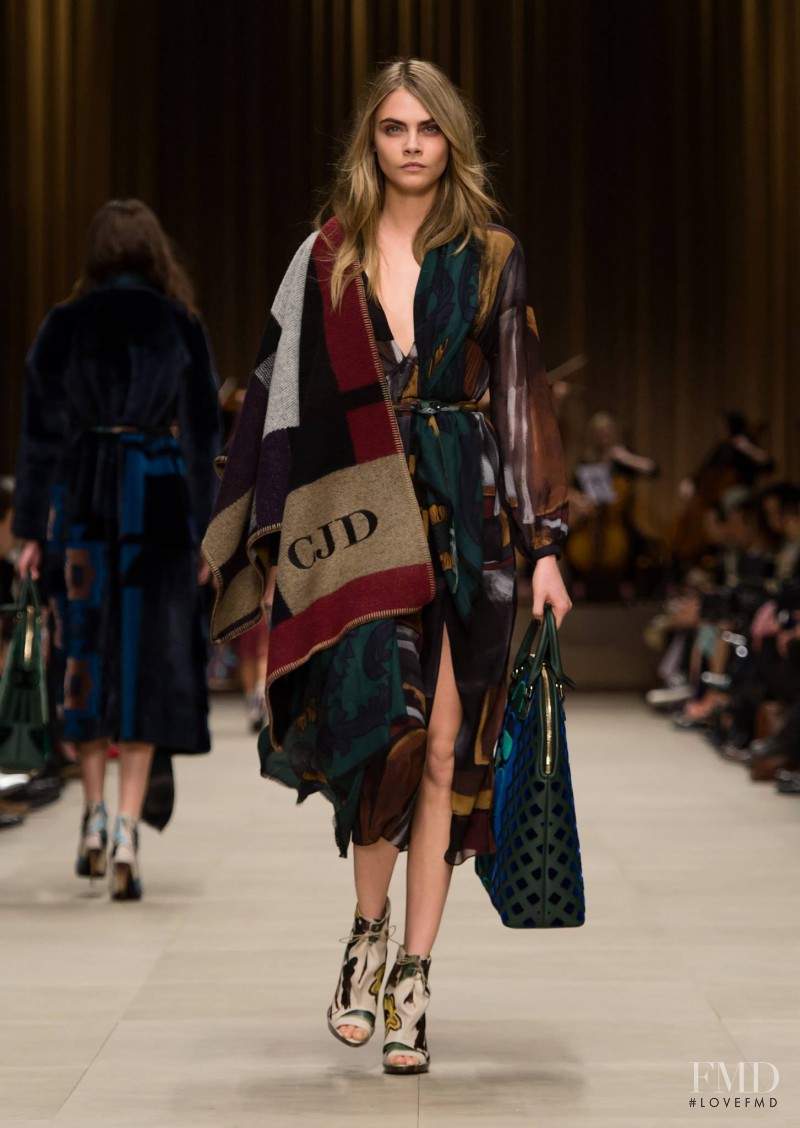 Cara Delevingne featured in  the Burberry Prorsum fashion show for Autumn/Winter 2014