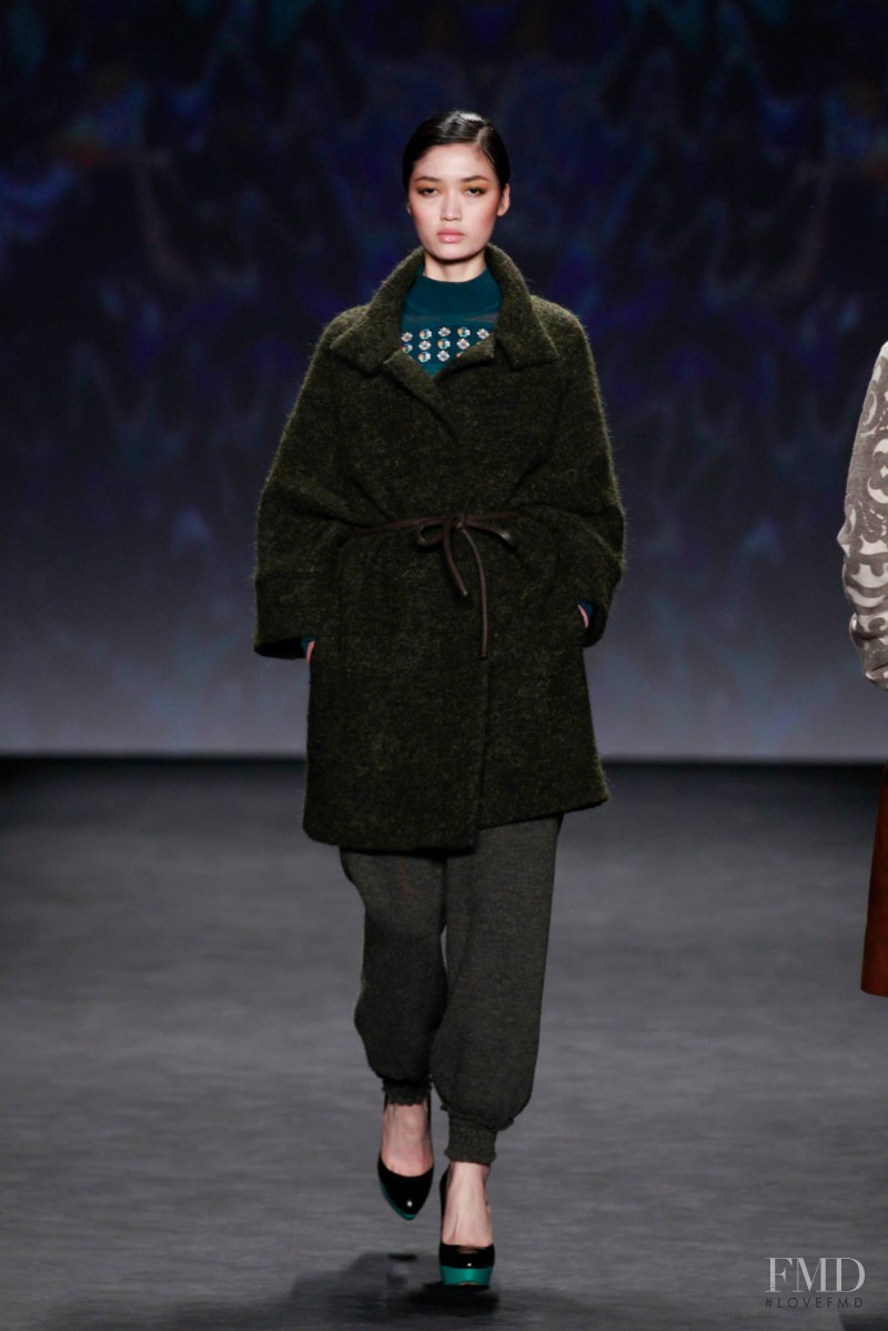 Qi Wen featured in  the Vivienne Tam fashion show for Autumn/Winter 2014
