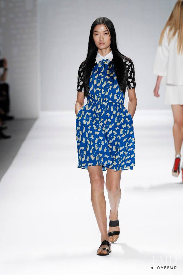 Qi Wen featured in  the Vivienne Tam fashion show for Spring/Summer 2014