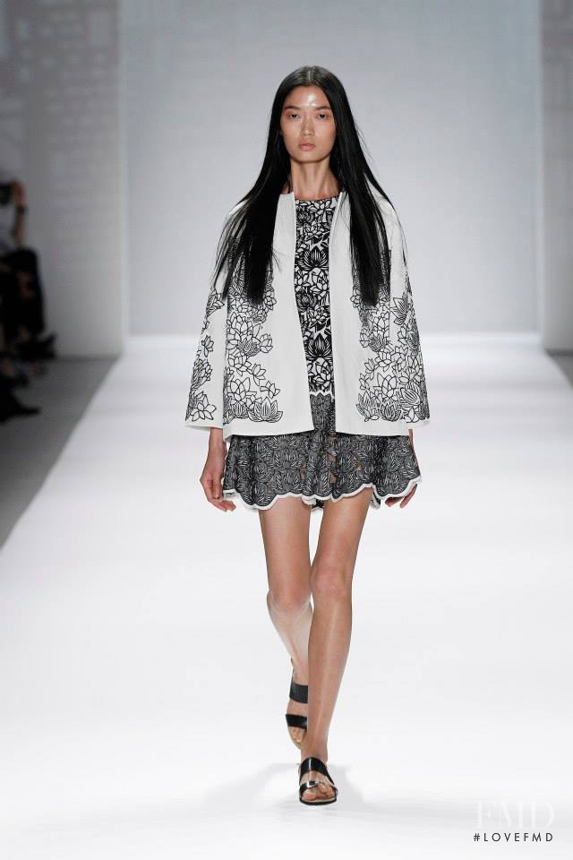 Qi Wen featured in  the Vivienne Tam fashion show for Spring/Summer 2014