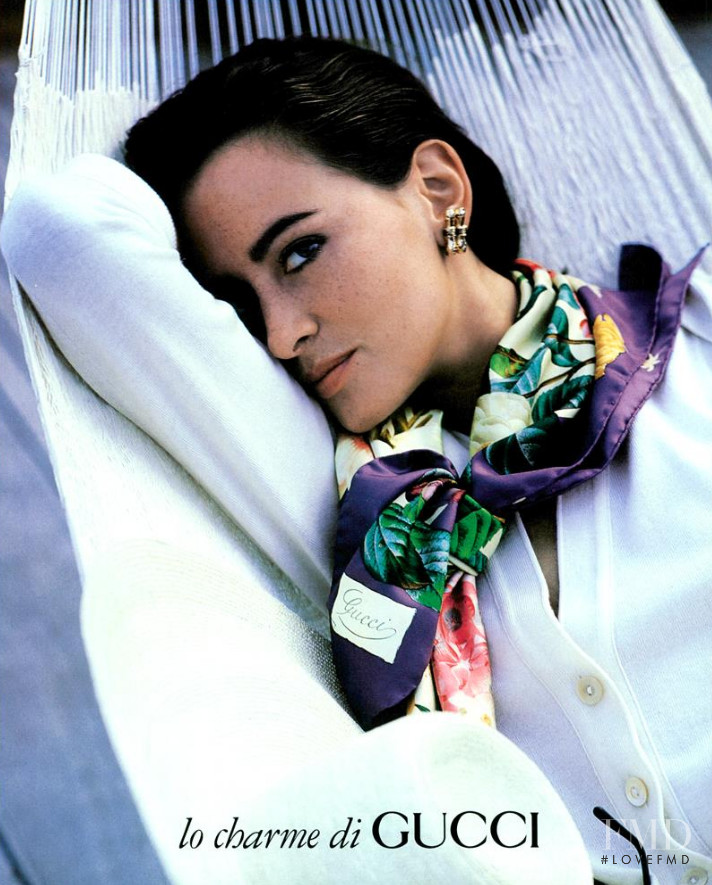 Irene Pfeiffer featured in  the Gucci advertisement for Spring/Summer 1991