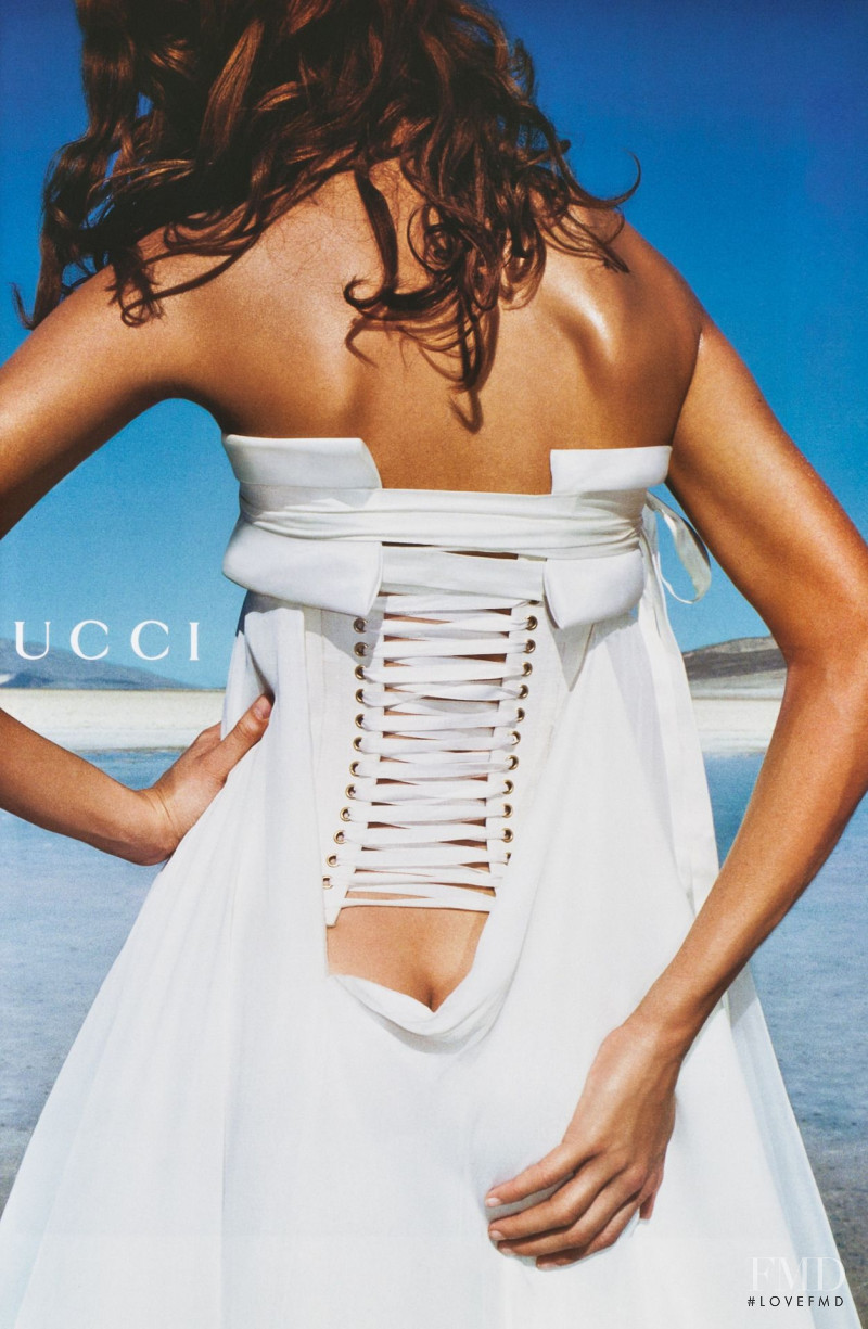 Rie Rasmussen featured in  the Gucci advertisement for Spring/Summer 2002